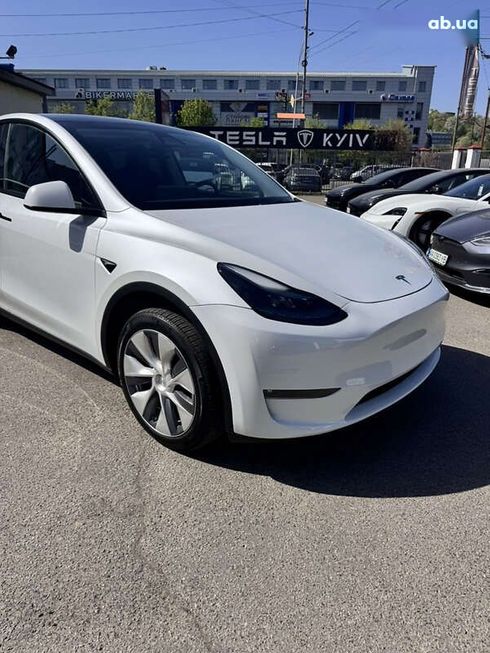 Tesla Model Y 2024 - фото 18