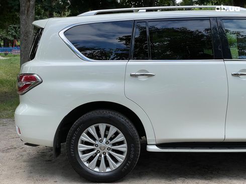 Nissan Patrol 2013 белый - фото 8