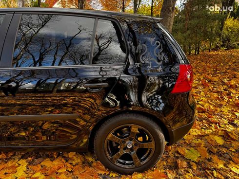 Volkswagen Golf 2004 черный - фото 10