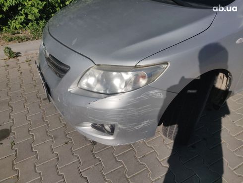 Toyota Corolla 2008 серебристый - фото 5