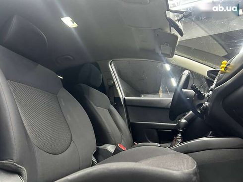 Kia Cerato 2011 - фото 7