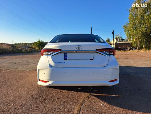 Toyota Corolla 2020 белый - фото 8