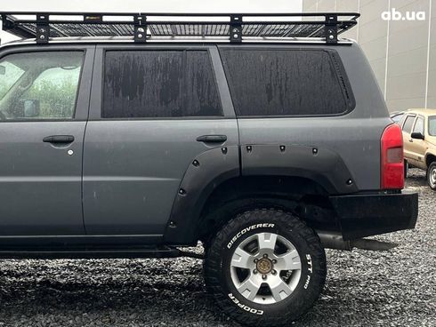 Nissan Patrol 2009 серый - фото 24