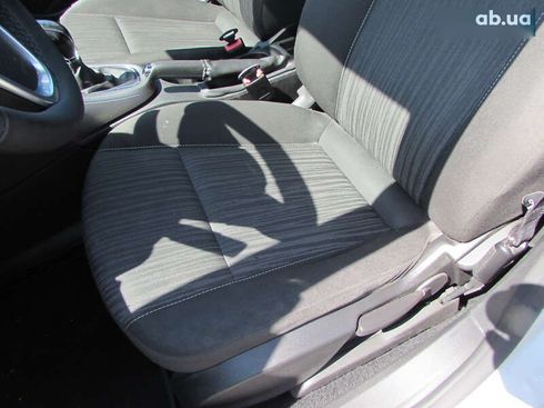 Opel Astra 2010 - фото 10
