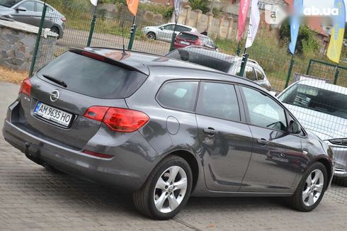 Opel Astra 2011 - фото 16