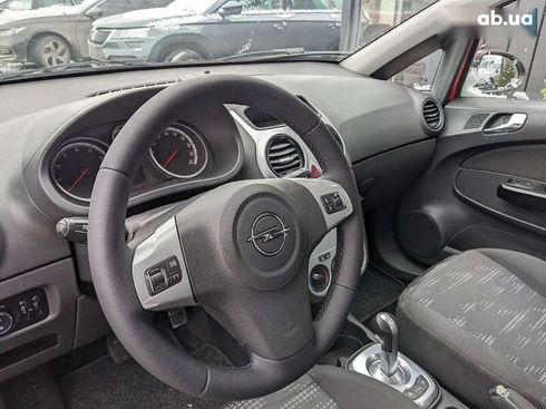 Opel Corsa 2012 - фото 12