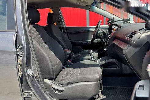 Kia Rio 2012 - фото 12