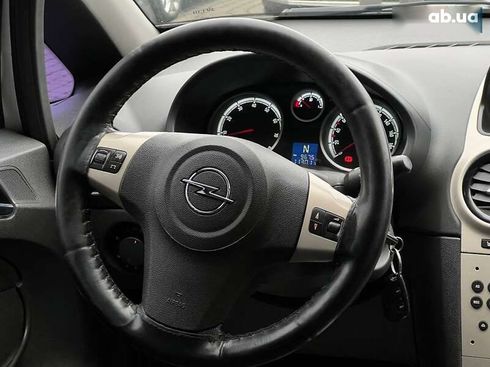 Opel Corsa 2008 - фото 13