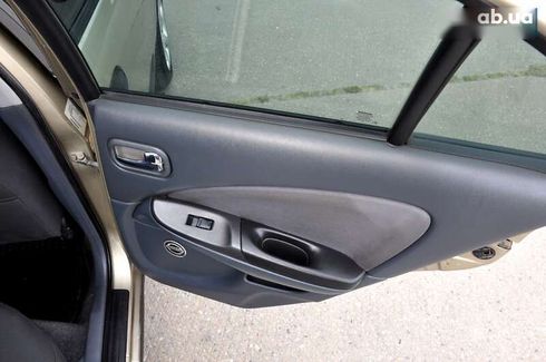 Nissan Almera 2004 - фото 23