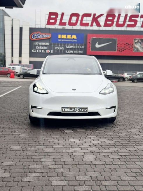 Tesla Model Y 2024 - фото 11