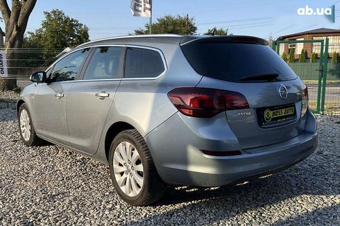 Opel Astra 2011 - фото 4