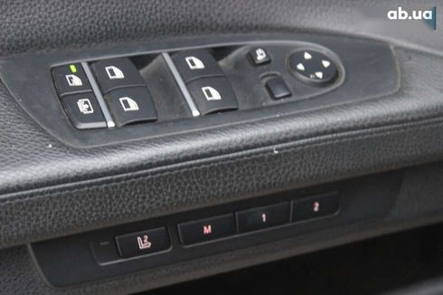 BMW 7 серия 2009 - фото 19