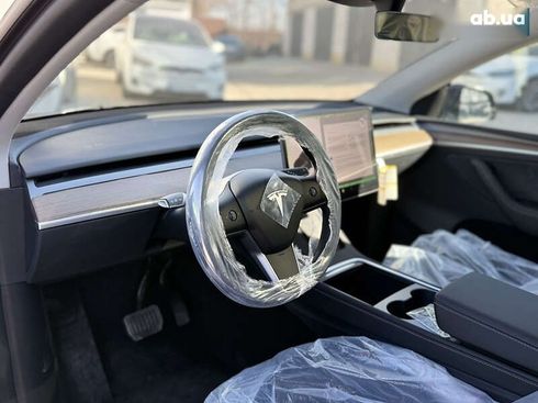 Tesla Model Y 2024 - фото 22