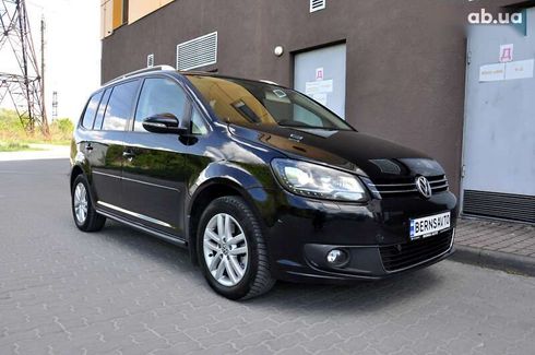 Volkswagen Touran 2012 - фото 12