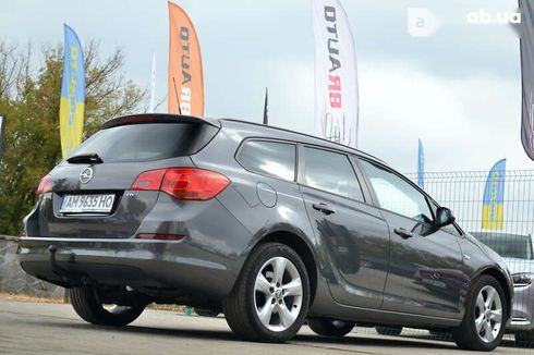 Opel Astra 2011 - фото 13