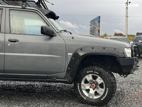 Nissan Patrol 2009 серый - фото 48
