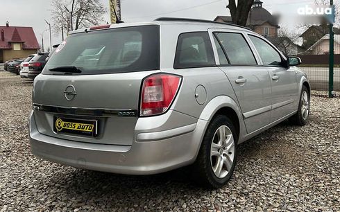 Opel Astra 2009 - фото 7