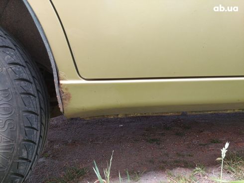 Daewoo Lanos 2006 золотистый - фото 17