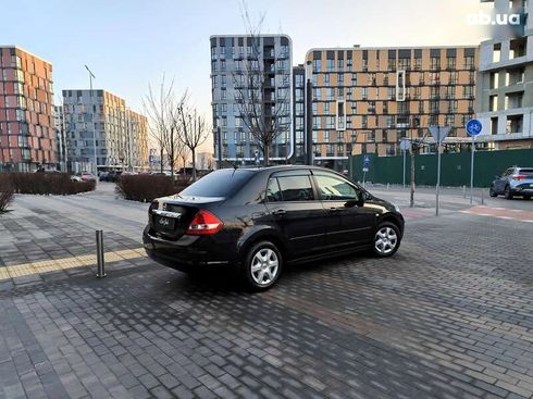 Nissan Tiida 2012 - фото 25