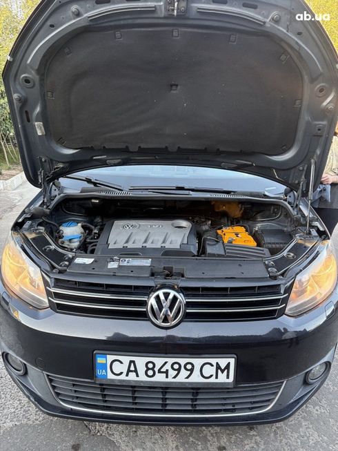 Volkswagen Touran 2010 черный - фото 4