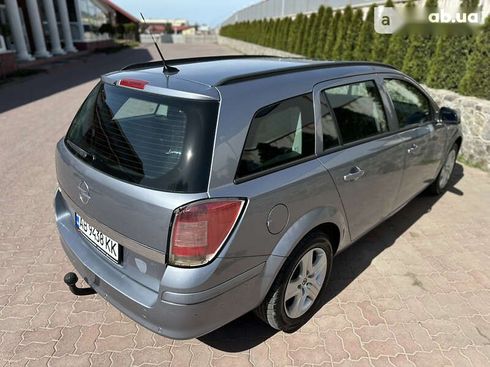 Opel Astra 2009 - фото 19