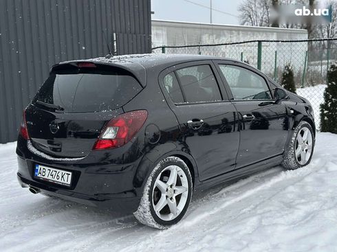 Opel Corsa 2010 - фото 13