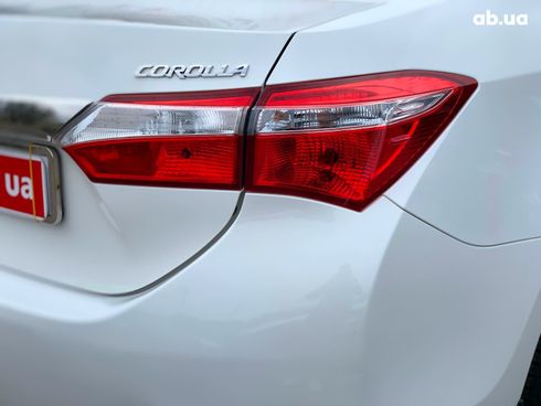 Toyota Corolla 2016 белый - фото 35