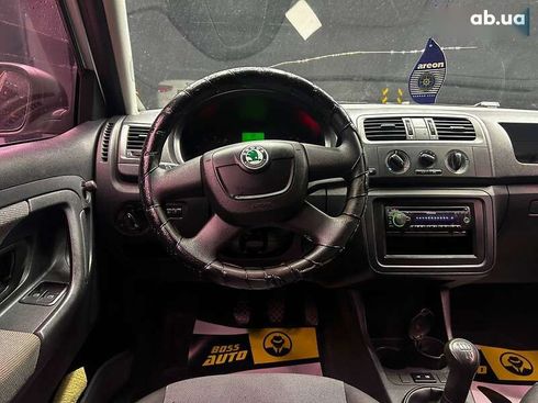 Skoda Fabia 2012 - фото 9