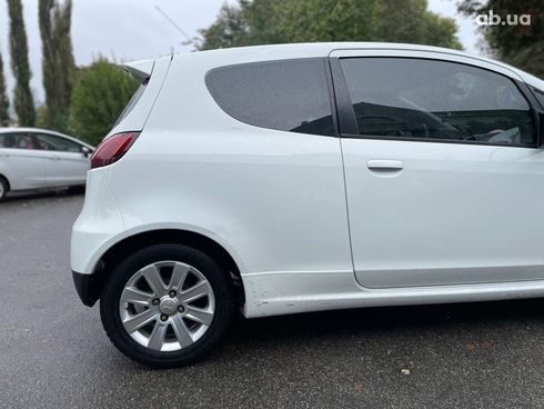 Mitsubishi Colt 2010 белый - фото 8