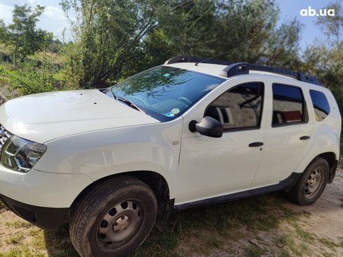 Dacia Duster 2016 белый - фото 9