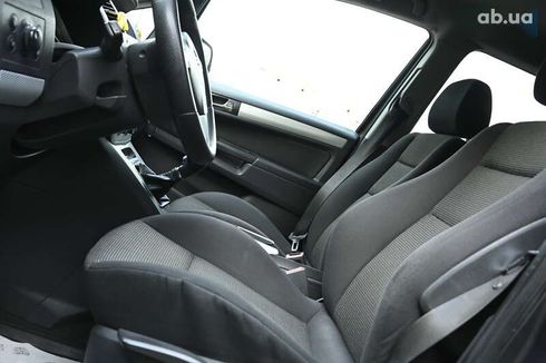 Opel Zafira 2010 - фото 11