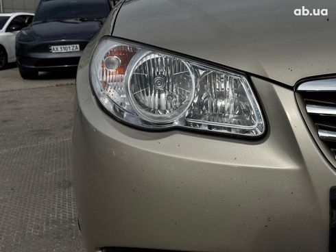 Hyundai Elantra 2010 бежевый - фото 7