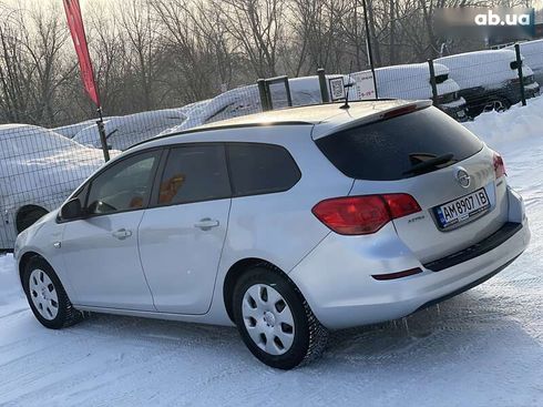 Opel Astra 2011 - фото 19