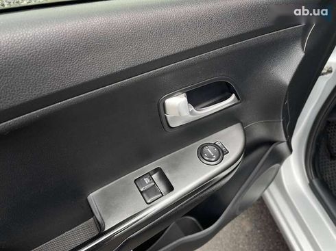 Kia Rio 2012 - фото 12