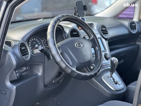 Kia Carens 2008 черный - фото 10
