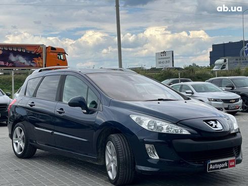 Peugeot 308 2010 синий - фото 11