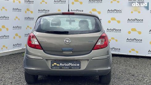Opel Corsa 2011 - фото 28