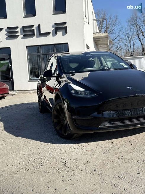 Tesla Model Y 2024 - фото 11