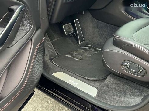 Aston Martin DBX 2021 - фото 12