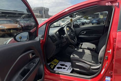 Kia Rio 2011 - фото 15