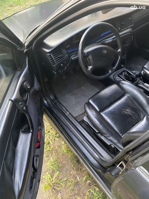 Opel Vectra 1997 черный - фото 6
