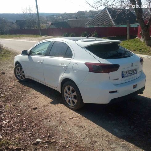 Mitsubishi Lancer 2009 белый - фото 2