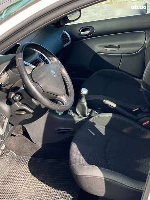 Peugeot 206 2009 - фото 20