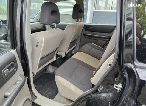 Nissan Navara 2006 черный - фото 4