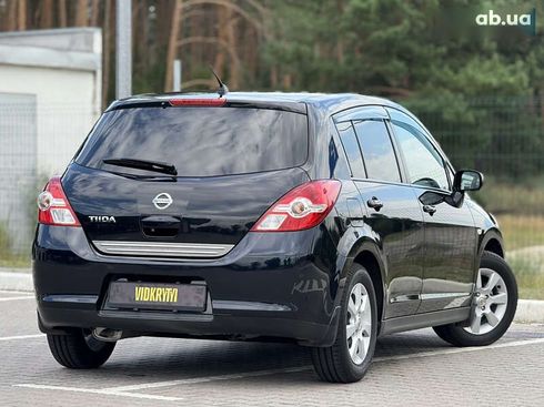 Nissan Tiida 2011 - фото 16