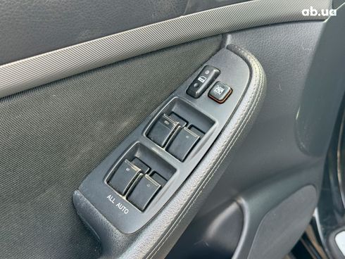 Toyota Avensis 2007 черный - фото 12