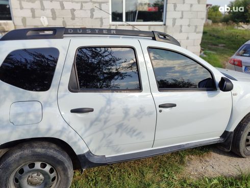 Dacia Duster 2016 белый - фото 10