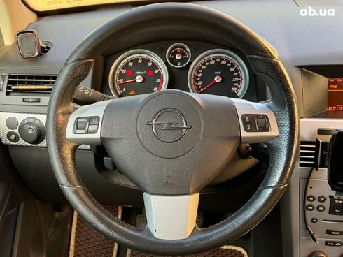 Opel Astra 2009 черный - фото 27
