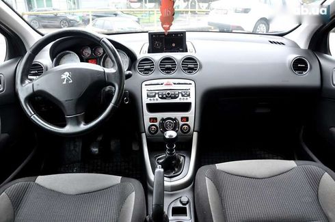 Peugeot 308 2012 - фото 24