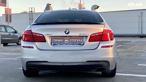BMW 5 серия 2012 серебристый - фото 5
